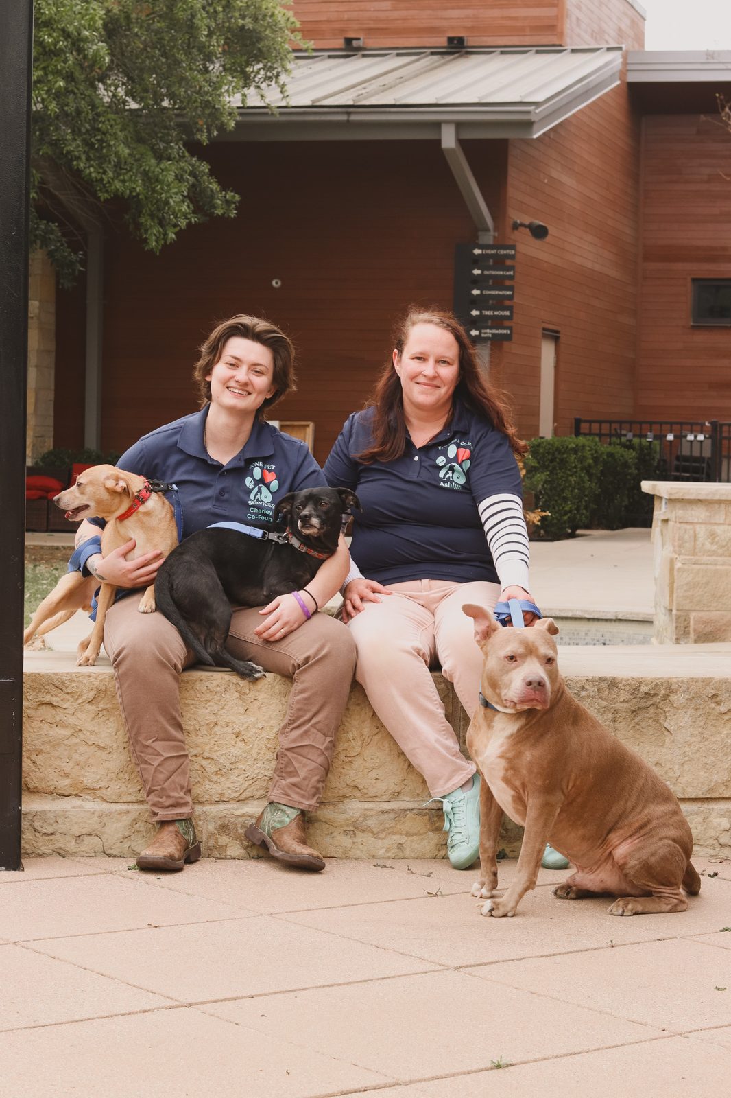 Ashlyn and Charley with three dogs